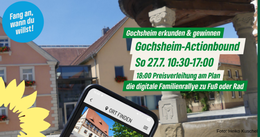 Ein Foto vom Plan, Rathaus im Hintergrund, vorne schräg ein Smartphone mit einer Seite aus dem Actionbound. Text: Gochsheim erkunden und gewinnen! Gochsheim-Actionbound So 27.7. 10:30-17:00 18:00 Preisverleihung am Plan die digitale Familienrallye zu Fuß oder Rad